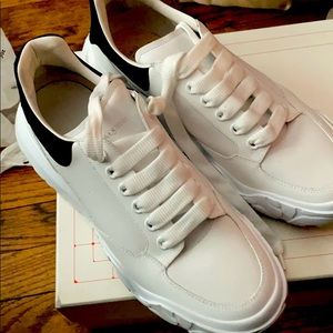 All white Alexander McQueen wide bottoms